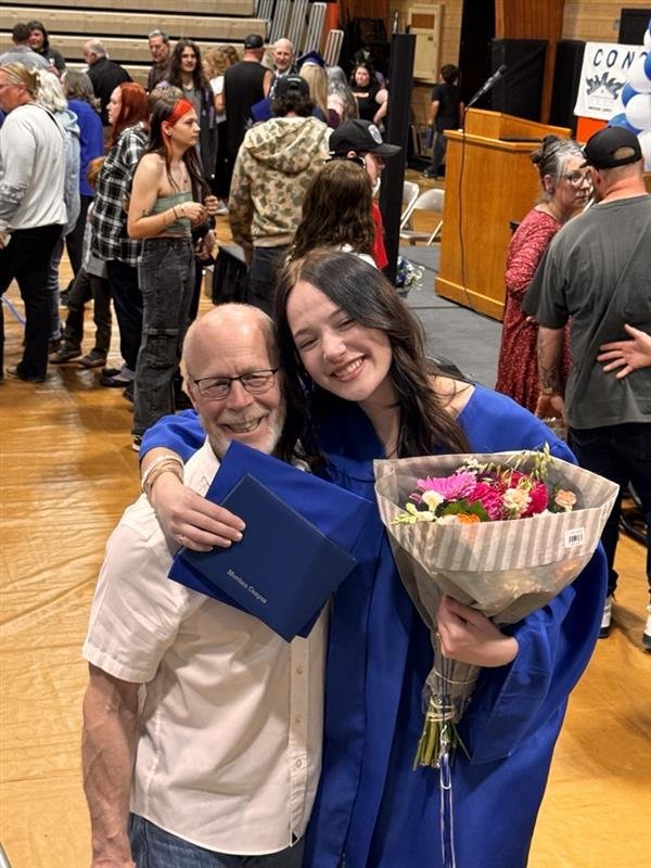 A proud family moment at a graduation ceremony