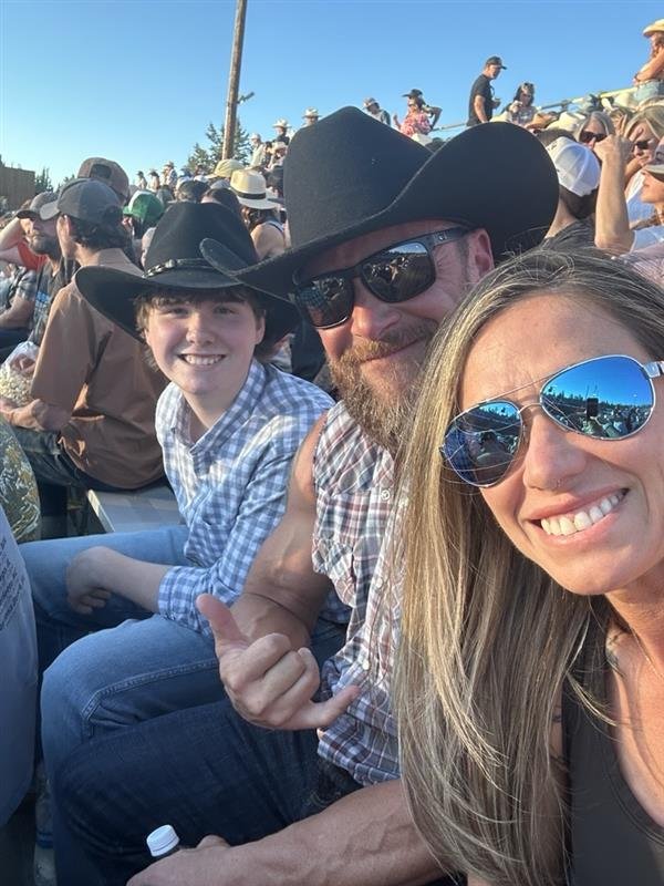 Ken Guffey with family at a rodeo