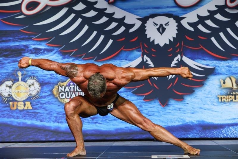 Ken Guffey back pose on stage